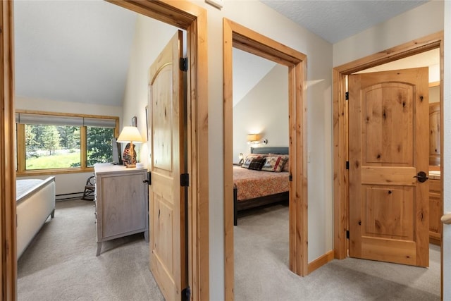 22300 US Highway 6 Unit 1746, Keystone, CO 80435 - hallway with light carpet and a baseboard radiator