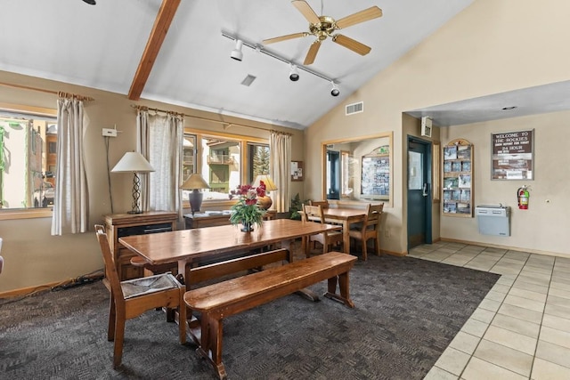 1945 Cornice Rd Unit 101D, Steamboat Springs, CO 80487 - dining area with track lighting, light tile patterned flooring, ceiling fan, high vaulted ceiling, and baseboards