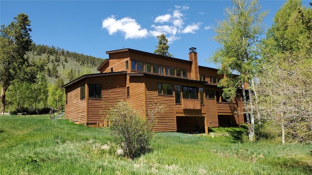 620 Tennis Club Rd Unit 1337, Keystone, CO 80435 - rear view of property with a chimney