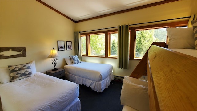 620 Tennis Club Rd Unit 1337, Keystone, CO 80435 - carpeted bedroom featuring vaulted ceiling, multiple windows, a baseboard heating unit, and ornamental molding