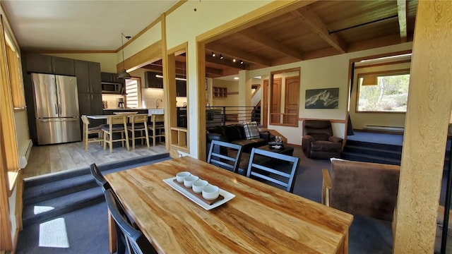 620 Tennis Club Rd Unit 1337, Keystone, CO 80435 - dining space with stairway, a baseboard radiator, and light wood-style flooring