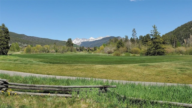 620 Tennis Club Rd Unit 1337, Keystone, CO 80435 - view of community featuring a mountain view, a lawn, and view of golf course