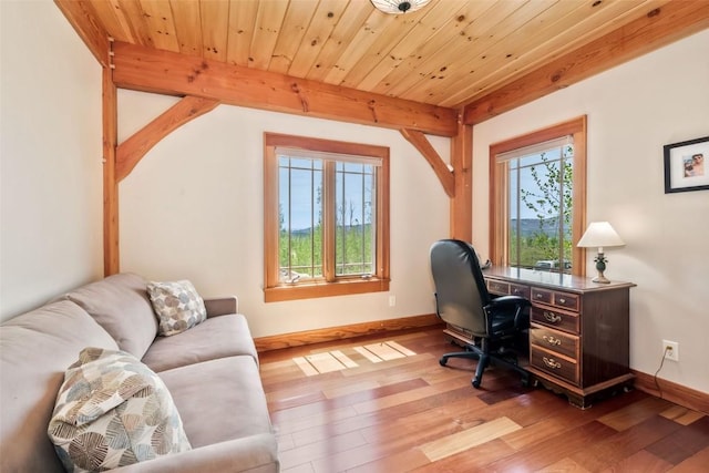 51193 Smith Creek Park Rd, Steamboat Springs, CO 80487 - office with baseboards, light wood finished floors, beamed ceiling, and wood ceiling