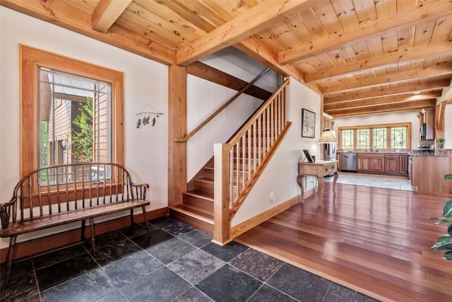 51193 Smith Creek Park Rd, Steamboat Springs, CO 80487 - entrance foyer with wooden ceiling, baseboards, stairs, and beamed ceiling