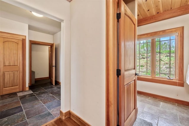 51193 Smith Creek Park Rd, Steamboat Springs, CO 80487 - hallway with stone tile floors and baseboards