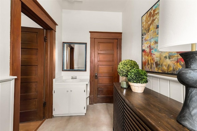 203 Spruce St, Steamboat Springs, CO 80487 - corridor with a sink and wainscoting