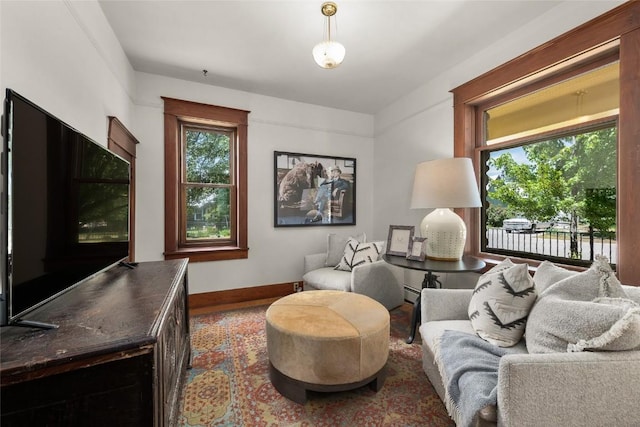 203 Spruce St, Steamboat Springs, CO 80487 - sitting room featuring healthy amount of natural light and baseboards