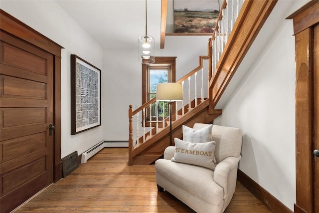 203 Spruce St, Steamboat Springs, CO 80487 - foyer featuring stairs, wood-type flooring, and baseboards