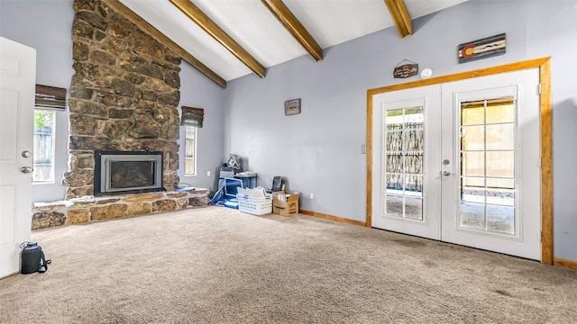1226 Barclay St, Craig, CO 81625 - living area featuring carpet, a stone fireplace, and french doors