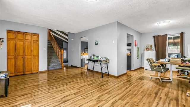 1226 Barclay St, Craig, CO 81625 - office with light wood-style flooring and a textured ceiling