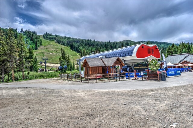 23034 US Highway 6 Unit 305, Keystone, CO 80435 - surrounding community with a forest view and an outbuilding