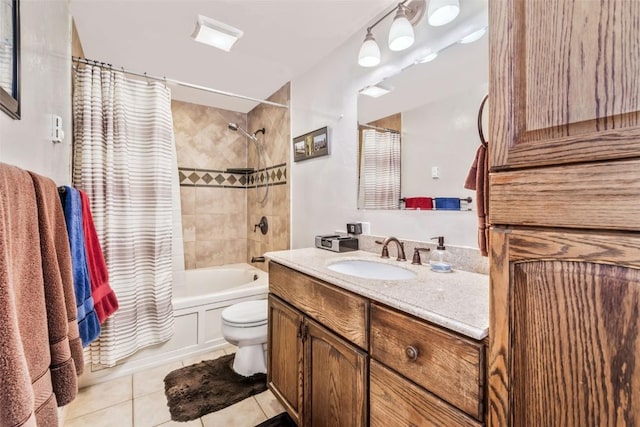 full bathroom featuring shower / bath combination with curtain, toilet, vanity, and tile patterned floors