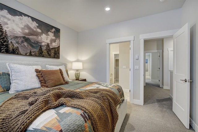 bedroom with baseboards, light carpet, and recessed lighting