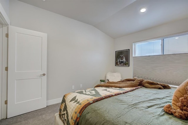 bedroom with recessed lighting, vaulted ceiling, baseboards, and light carpet