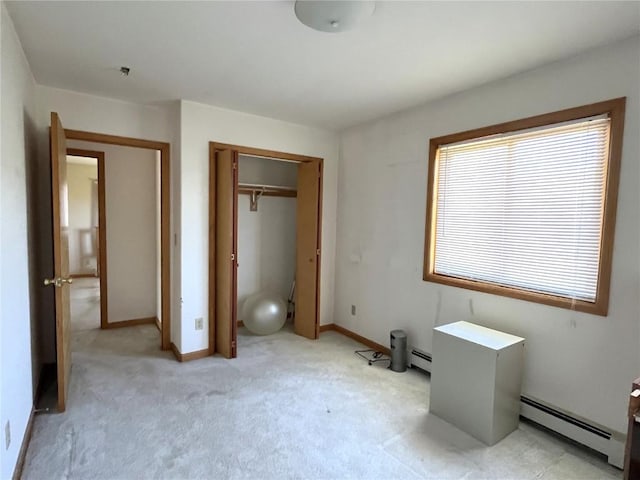 21725 4th Ave, Phippsburg, CO 80469 - unfurnished bedroom with a baseboard heating unit, a closet, and light colored carpet