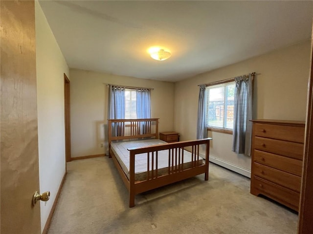 21725 4th Ave, Phippsburg, CO 80469 - bedroom with a baseboard radiator and light colored carpet