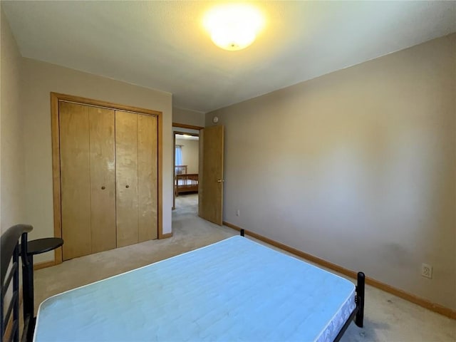 21725 4th Ave, Phippsburg, CO 80469 - bedroom with light colored carpet and a closet