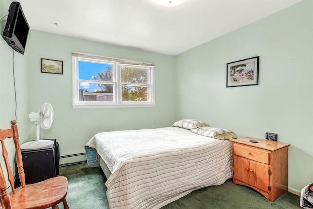 bedroom with dark colored carpet and a baseboard radiator