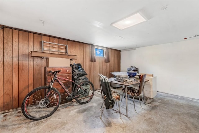 dining area with wood walls