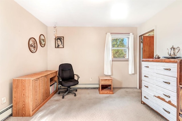 carpeted home office with a baseboard heating unit