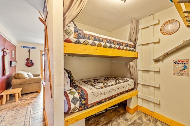 bedroom with baseboards
