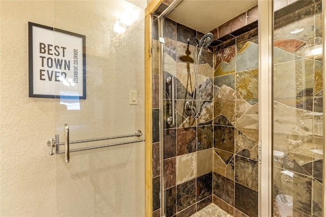 full bathroom with a shower stall