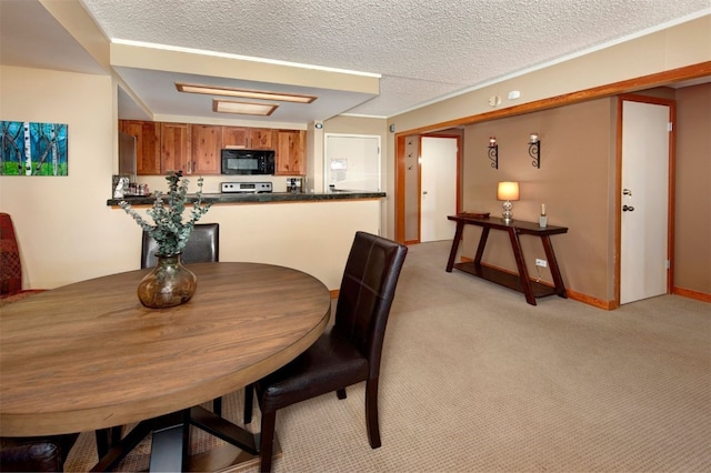 21640 US Highway 6 Unit 2122, Keystone, CO 80435 - dining area with light colored carpet and a textured ceiling