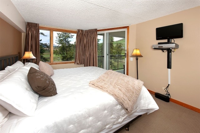 21640 US Highway 6 Unit 2122, Keystone, CO 80435 - carpeted bedroom with access to exterior and a textured ceiling