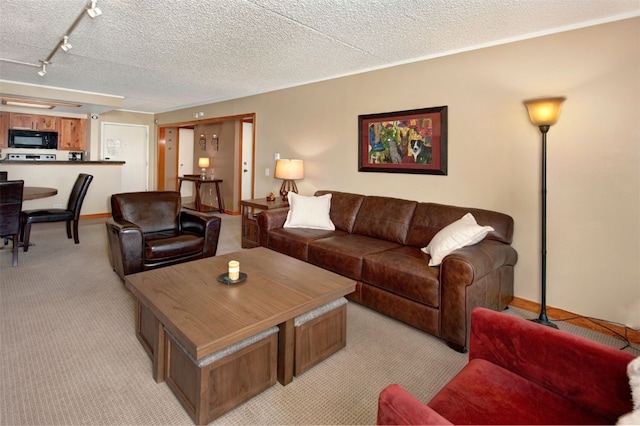 21640 US Highway 6 Unit 2122, Keystone, CO 80435 - living room featuring light carpet and baseboards