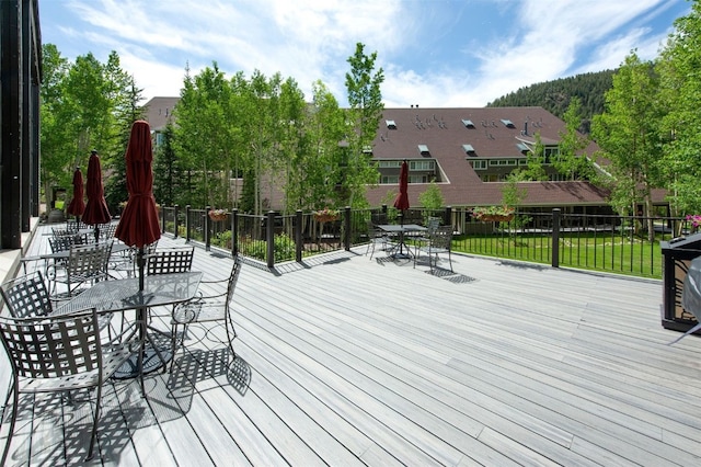 21640 US Highway 6 Unit 2122, Keystone, CO 80435 - wooden terrace with outdoor dining space