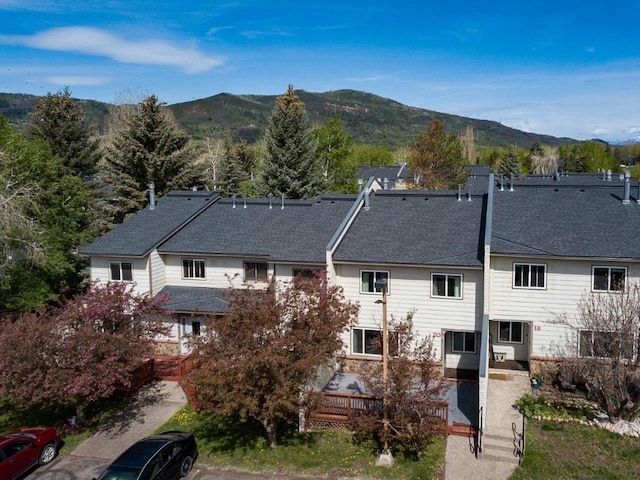 20 Sequoia Ct Unit 20, Steamboat Springs, CO 80487 - back of property featuring a mountain view and a shingled roof