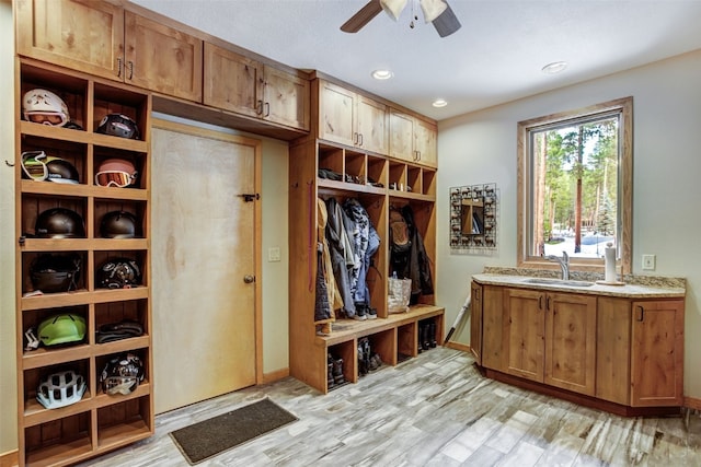 47 Forest Cir, Breckenridge, CO 80424 - mudroom with a sink, a ceiling fan, light wood finished floors, baseboards, and recessed lighting