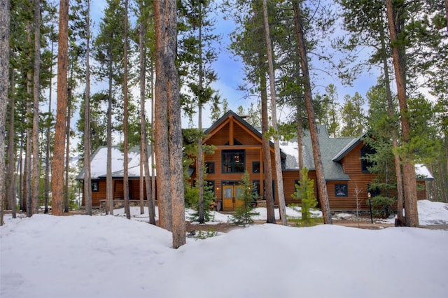 rustic home featuring covered porch