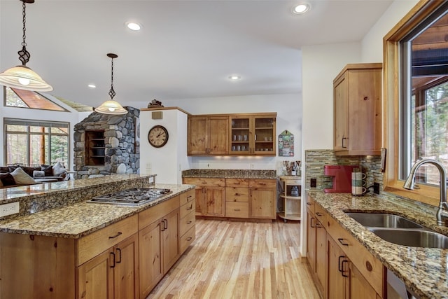 47 Forest Cir, Breckenridge, CO 80424 - kitchen featuring stainless steel gas cooktop, a sink, plenty of natural light, light wood-style flooring, and recessed lighting