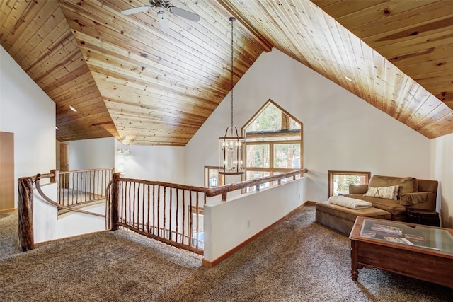 bonus room featuring baseboards, carpet, and wooden ceiling