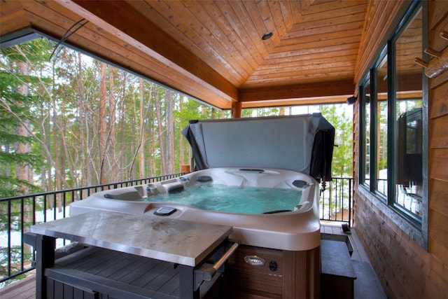 deck with a hot tub