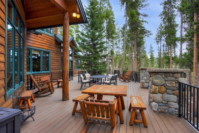 deck with outdoor dining space