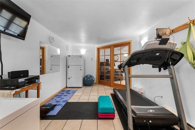 26635 Neptune Pl, Clark, CO 80428 - workout area with tile patterned flooring and french doors
