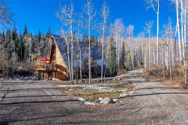 26635 Neptune Pl, Clark, CO 80428 - view of dirt / gravel road featuring a wooded view