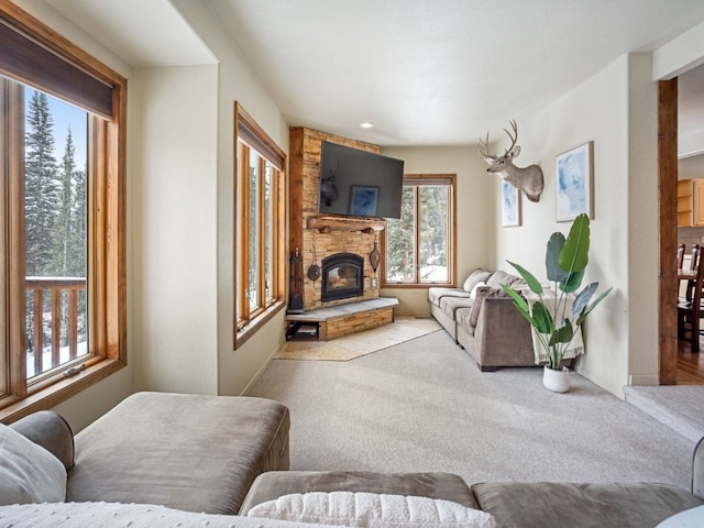 234 Peterson Dr, Alma, CO 80440 - carpeted living room with a stone fireplace