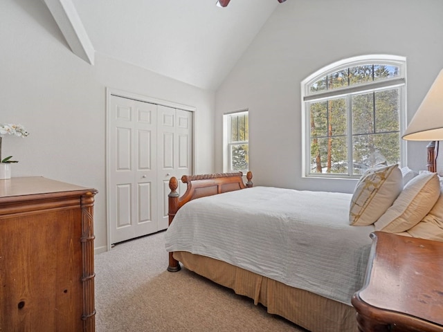 234 Peterson Dr, Alma, CO 80440 - bedroom with carpet, a closet, high vaulted ceiling, and a ceiling fan