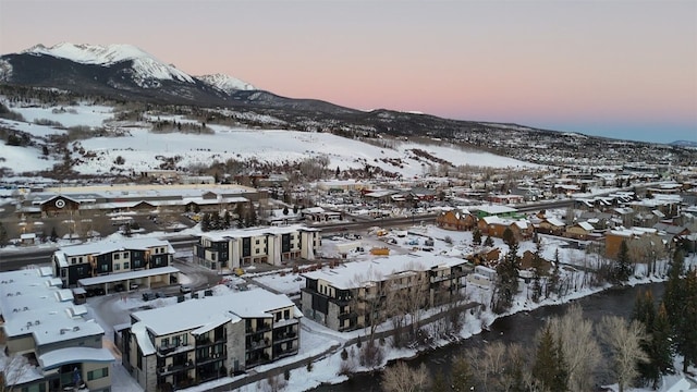 740 Blue River Pkwy Unit A21, Silverthorne, CO 80498 - snowy aerial view with a mountain view