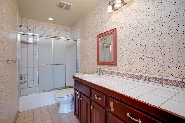 31695 Aspen Ridge Rd, Steamboat Springs, CO 80487 - bathroom featuring tile patterned flooring, vanity, and shower / bath combination with glass door