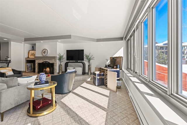 carpeted living room featuring a warm lit fireplace