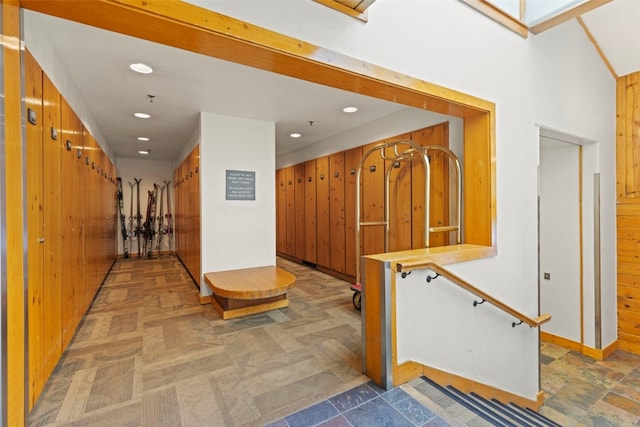 hallway featuring recessed lighting and baseboards