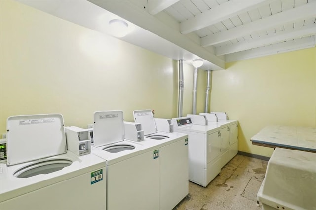 4200 Lodge Pole Cir Unit 205, Silverthorne, CO 80498 - community laundry featuring washer and dryer and wood ceiling