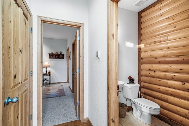 1996 Al Gulch Rd, Jefferson, CO 80456 - bathroom with log walls and toilet