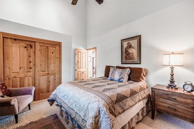 1996 Al Gulch Rd, Jefferson, CO 80456 - carpeted bedroom featuring a high ceiling and ceiling fan