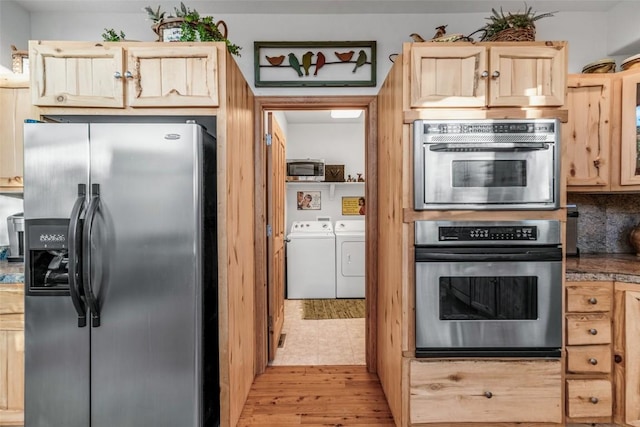 1996 Al Gulch Rd, Jefferson, CO 80456 - kitchen featuring stainless steel appliances, washing machine and dryer, and light brown cabinets