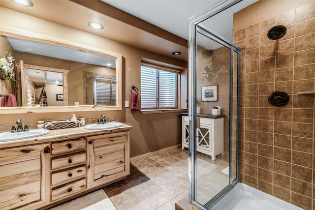 1996 Al Gulch Rd, Jefferson, CO 80456 - full bath featuring a shower stall, double vanity, and recessed lighting